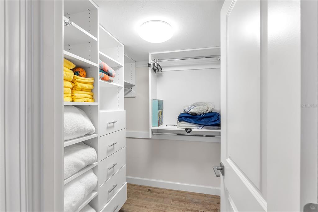 1000 Longboat Club Road, Unit 204 Longboat Key, FL 34228 - Photo 40 of 66 a kitchen with a refrigerator and a sink