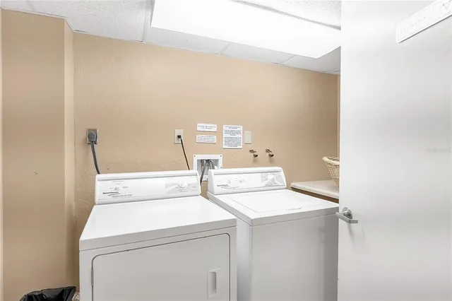 an aerial view of a house with swimming pool garden and patio