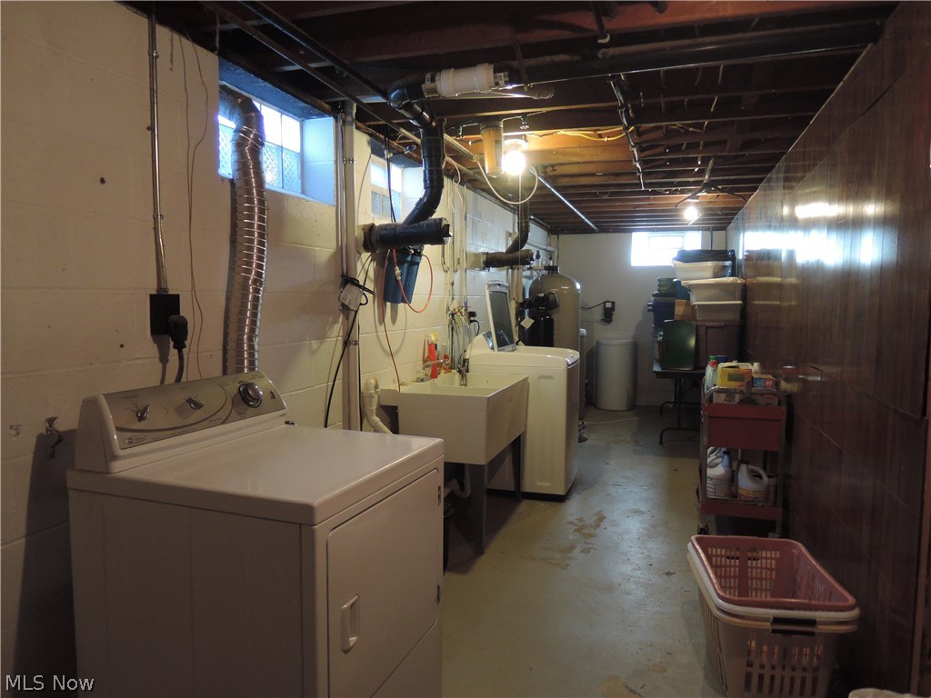 8002 Mulberry Road Chesterland, OH 44026 - Photo 18 of 18 Huge utility room. New within the last 5 years: breaker box, boiler, hot water tank, water softener, and chlorination system.