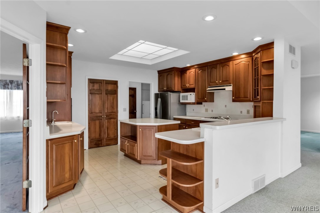 5005 Harris Hill Road Clarence, NY 14221 - Photo 16 of 38 kitchen view from breakfast nook