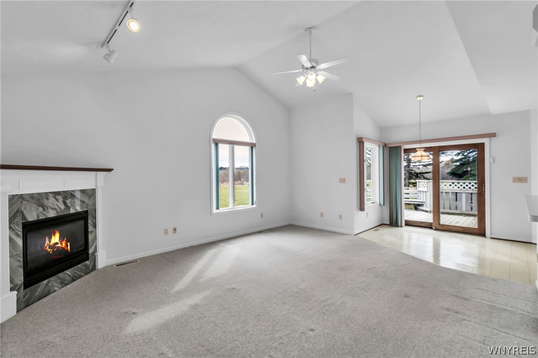 5005 Harris Hill Road Clarence, NY 14221 - Photo 19 of 38 family room with breakfast nook patio door