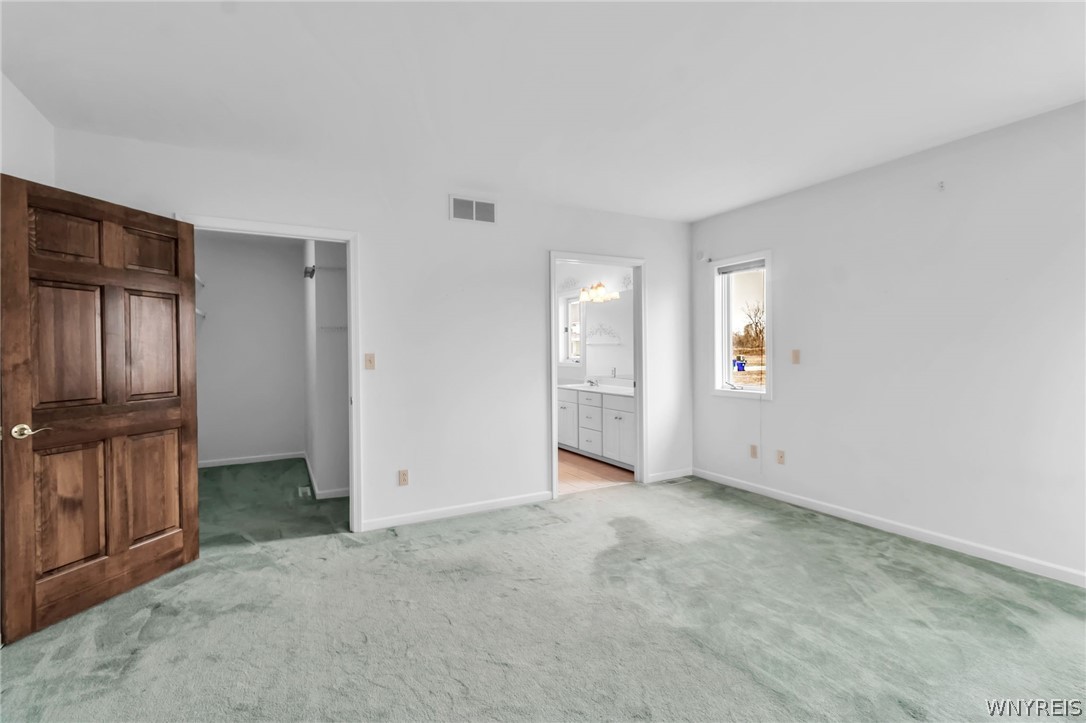 5005 Harris Hill Road Clarence, NY 14221 - Photo 21 of 38 Primary bedroom
