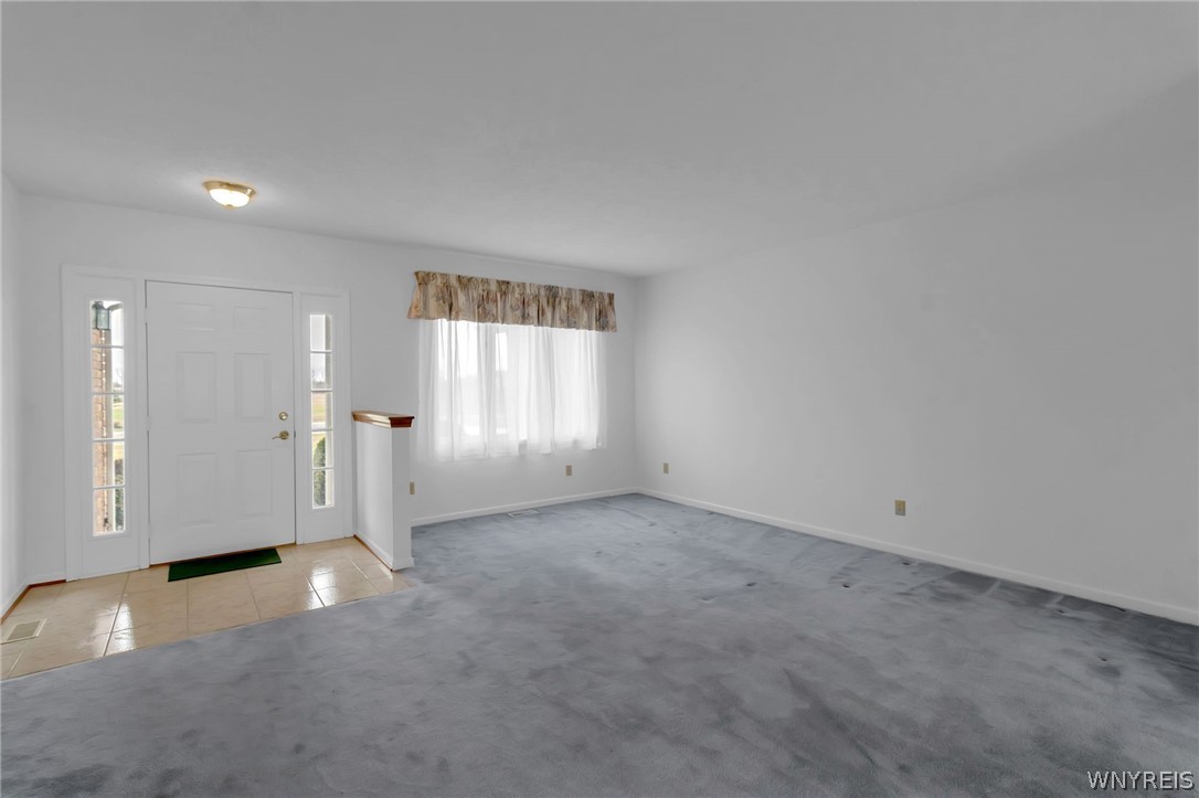 5005 Harris Hill Road Clarence, NY 14221 - Photo 9 of 38 living room