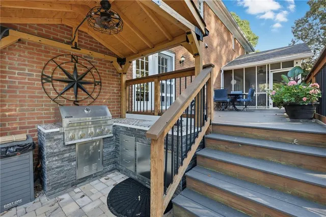 a bathroom with a toilet a sink and shower