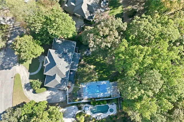 a kitchen with granite countertop a sink and a window