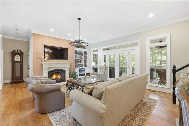 a kitchen with stainless steel appliances granite countertop a sink stove and microwave