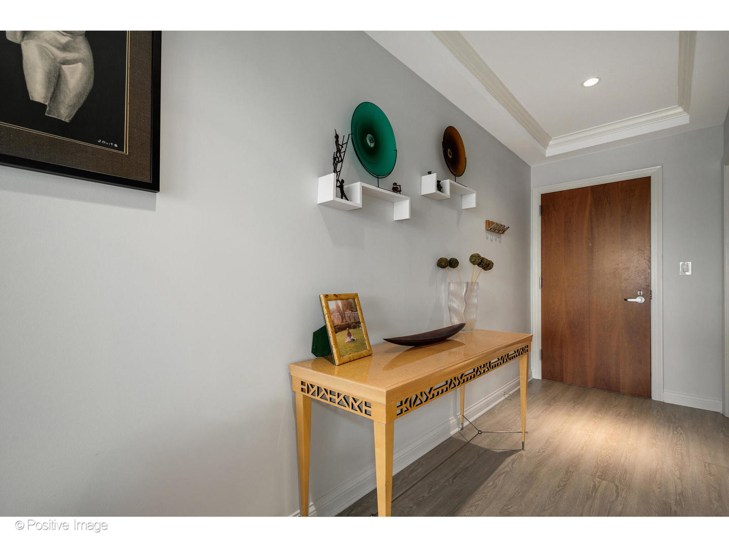 1201 South Prairie Avenue, Unit 2402 Chicago, IL 60605 - Photo 2 of 32 a view of kitchen island with wooden floor