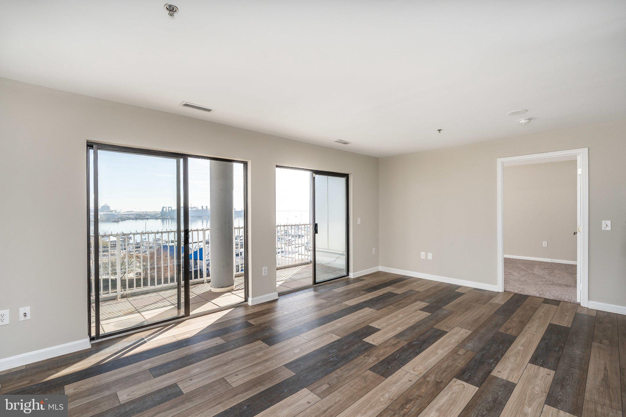 2702 Lighthouse Point East, Unit 532 Baltimore, MD 21224 - Photo 1 of 41 Bright waterfront living space.