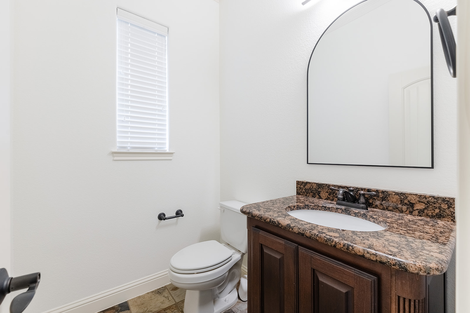 114 North Saddle Ridge Drive Cedar Park, TX 78613 - Photo 23 of 40 a bathroom with a granite countertop sink toilet and mirror