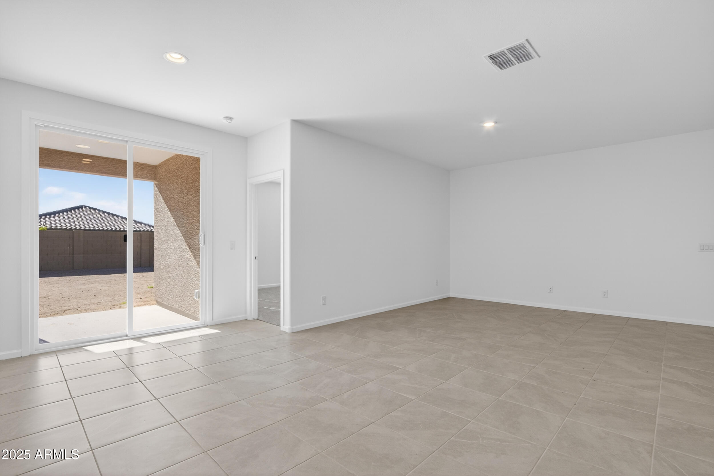 12509 East Verbina Lane Florence, AZ 85132 - Photo 12 of 31 wooden floor in an empty room