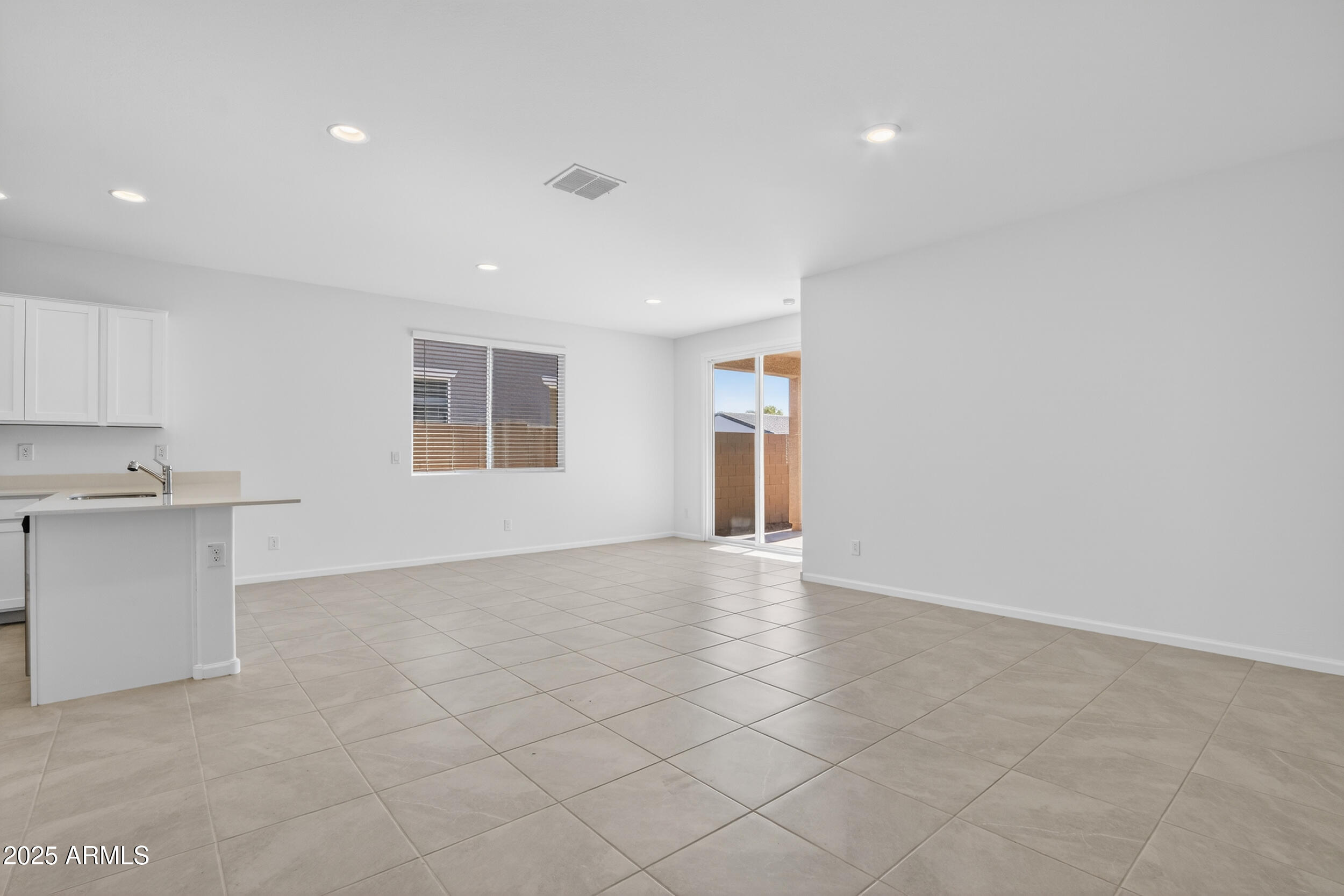 12509 East Verbina Lane Florence, AZ 85132 - Photo 14 of 31 a view of an empty room with a window