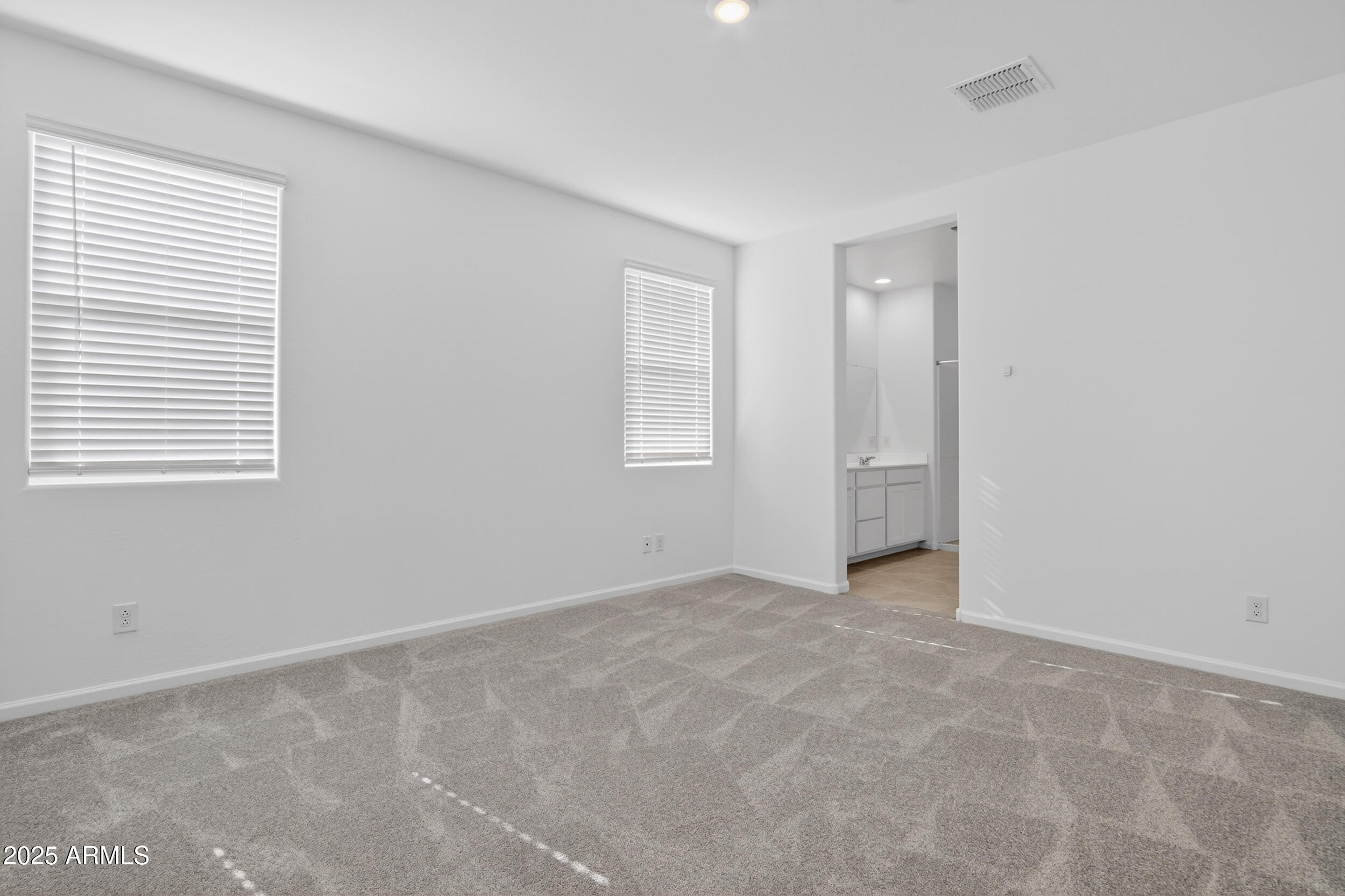 12509 East Verbina Lane Florence, AZ 85132 - Photo 15 of 31 an empty room with windows