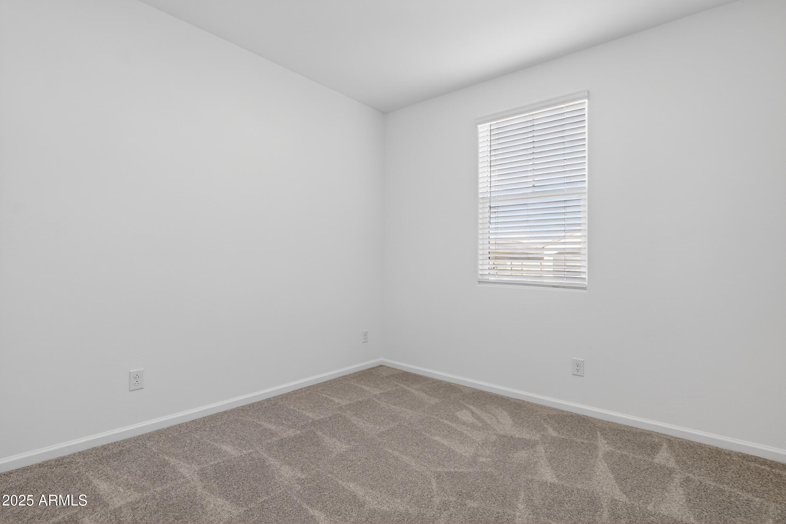12509 East Verbina Lane Florence, AZ 85132 - Photo 23 of 31 an empty room with a window