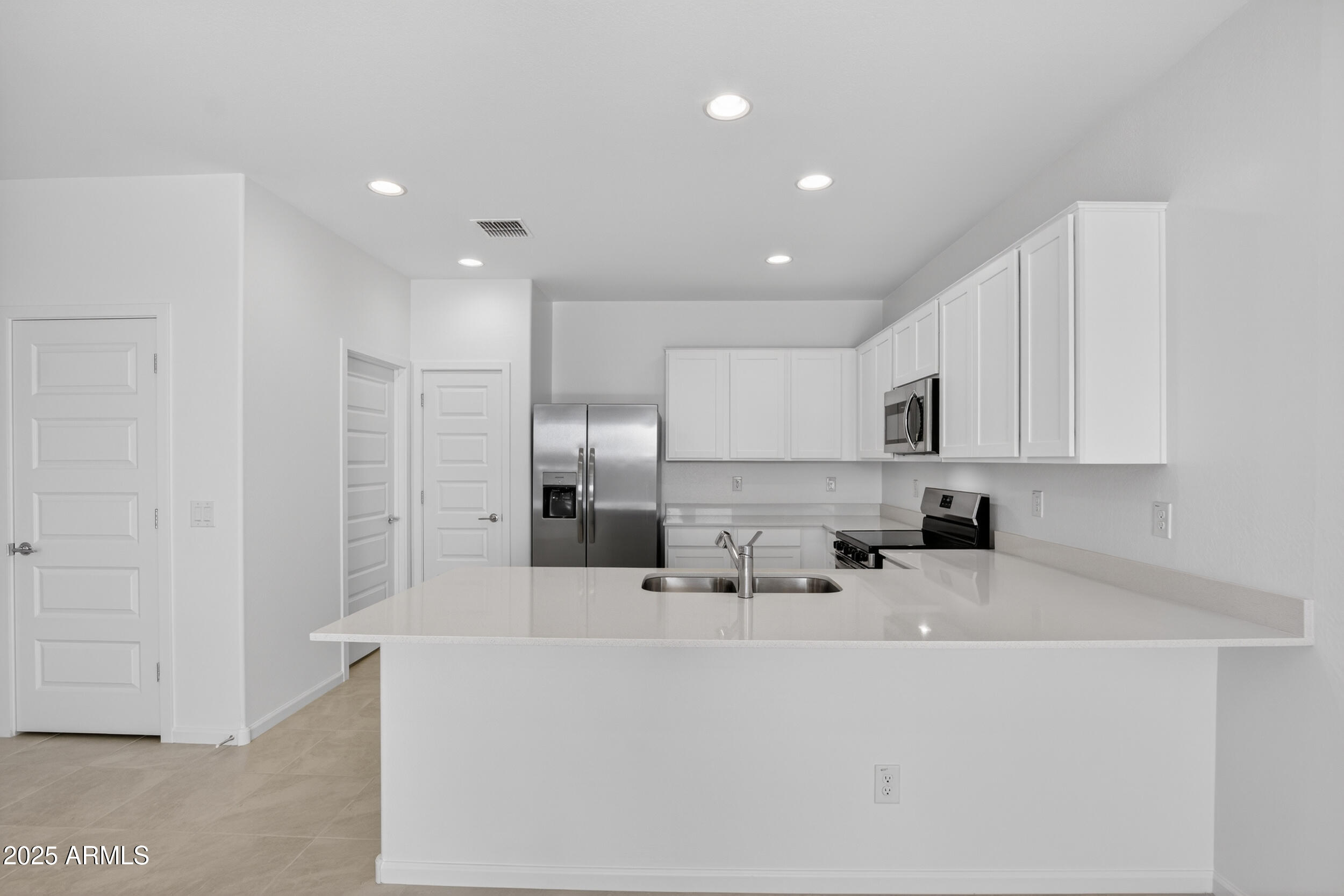 12509 East Verbina Lane Florence, AZ 85132 - Photo 3 of 31 a view of kitchen with stainless steel appliances