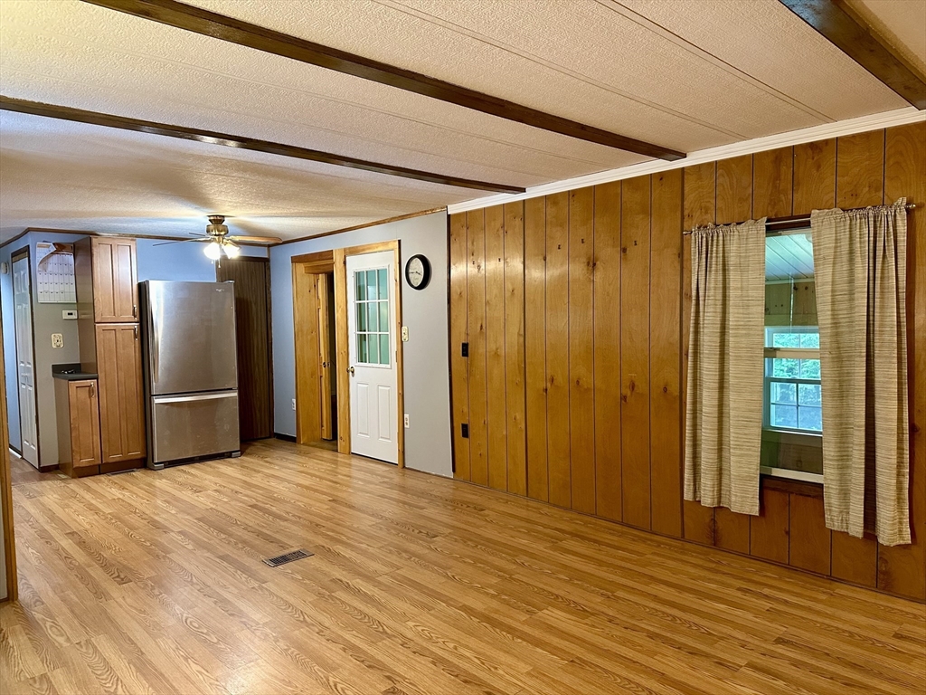 55 Heath Road Colrain, MA 01340 - Photo 16 of 32 a view of empty room with wooden floor