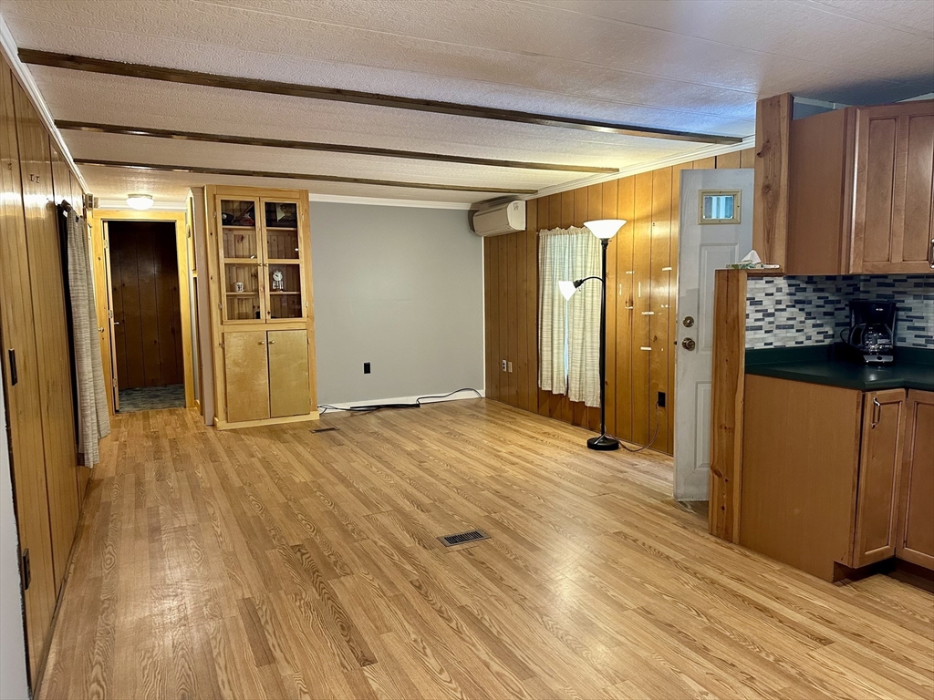 55 Heath Road Colrain, MA 01340 - Photo 18 of 32 a view of empty room with wooden floor
