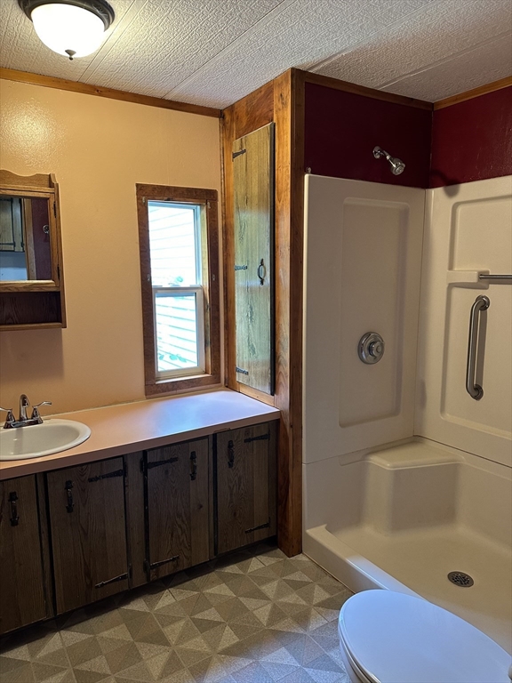 55 Heath Road Colrain, MA 01340 - Photo 22 of 32 a bathroom with a sink a toilet and bathtub