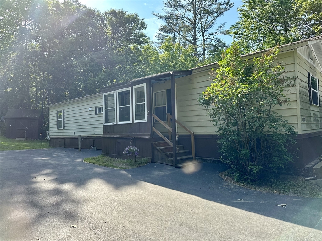 55 Heath Road Colrain, MA 01340 - Photo 6 of 32 a view of a house with a yard and tree s