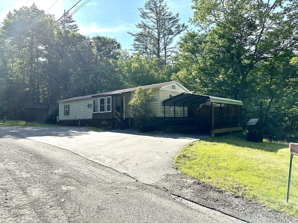 55 Heath Road Colrain, MA 01340 - Photo 9 of 32 a house view with a garden space