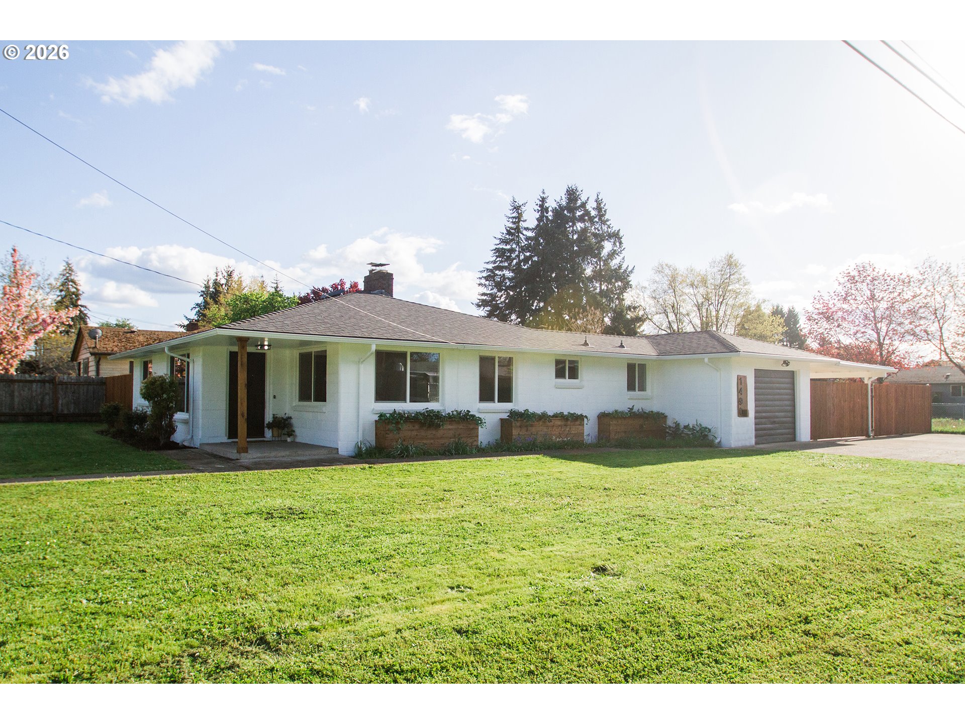 1490 Taft Street Eugene, OR 97402 - Photo 1 of 36 a view of a house with a yard and sitting area