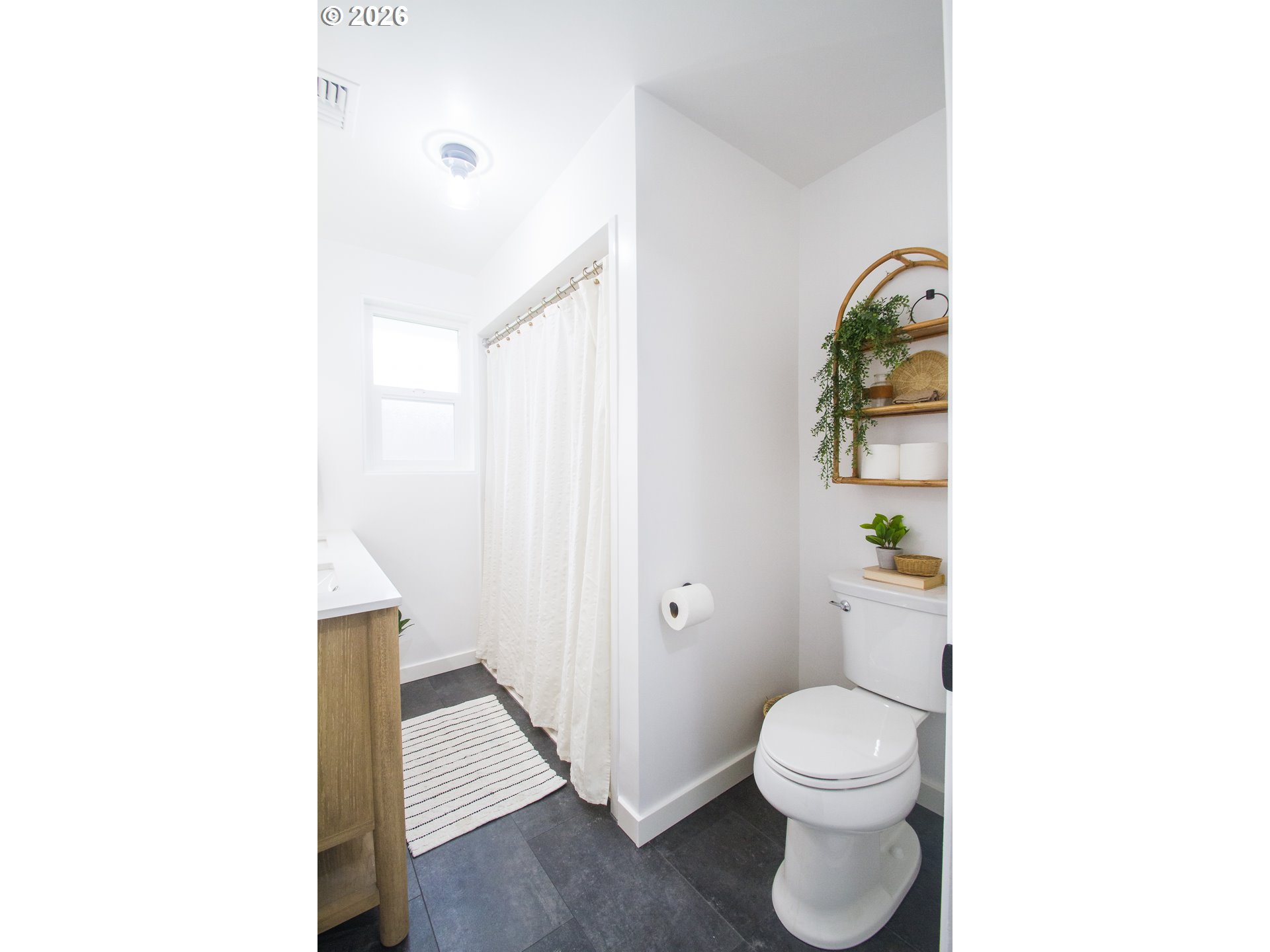 1490 Taft Street Eugene, OR 97402 - Photo 17 of 36 a bathroom with a toilet and a shower
