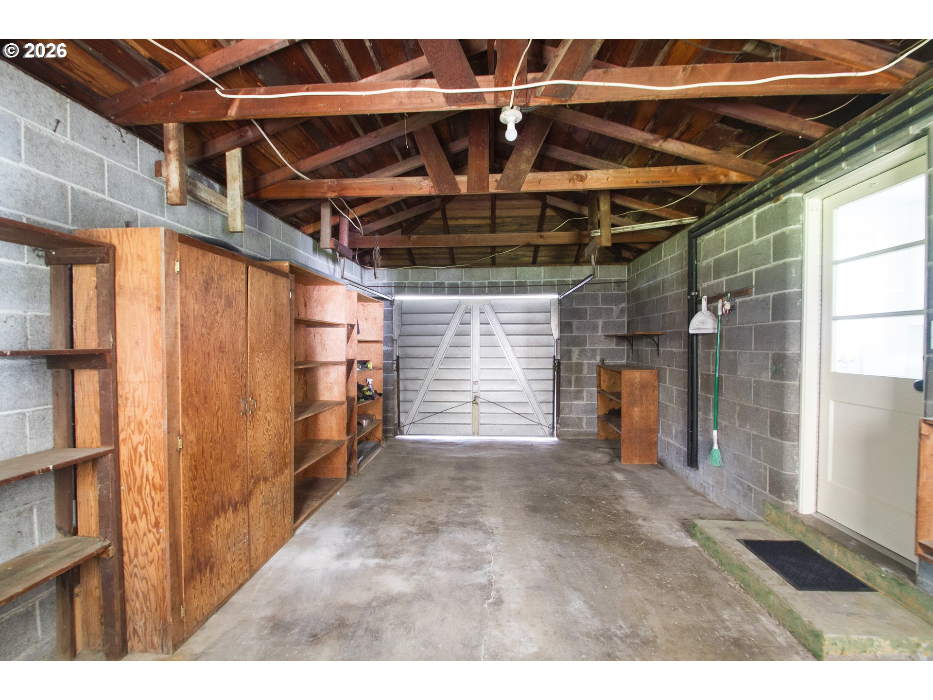 1490 Taft Street Eugene, OR 97402 - Photo 35 of 36 a view of empty room with wooden walls