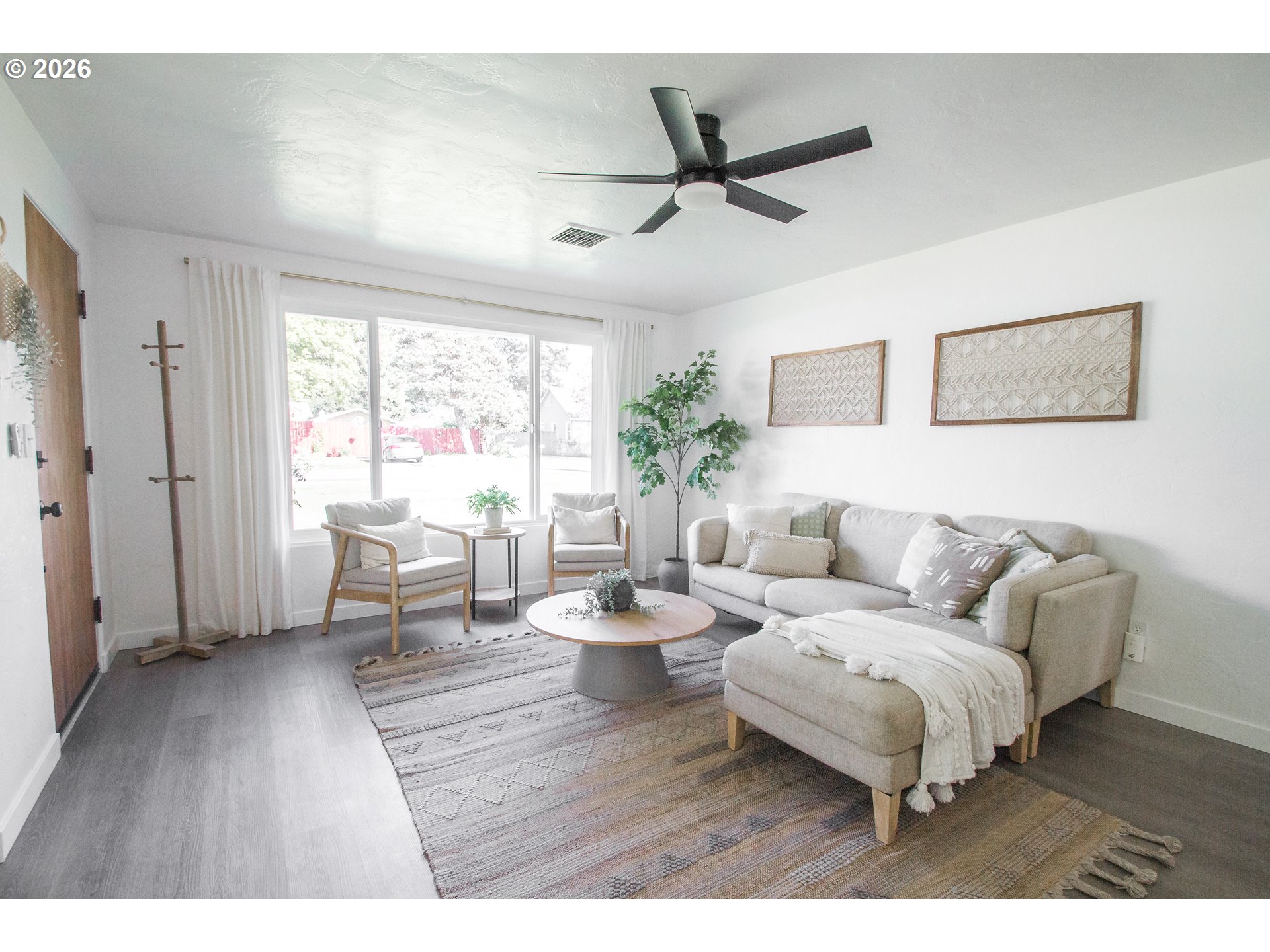 1490 Taft Street Eugene, OR 97402 - Photo 5 of 36 a living room with furniture and a wooden floor