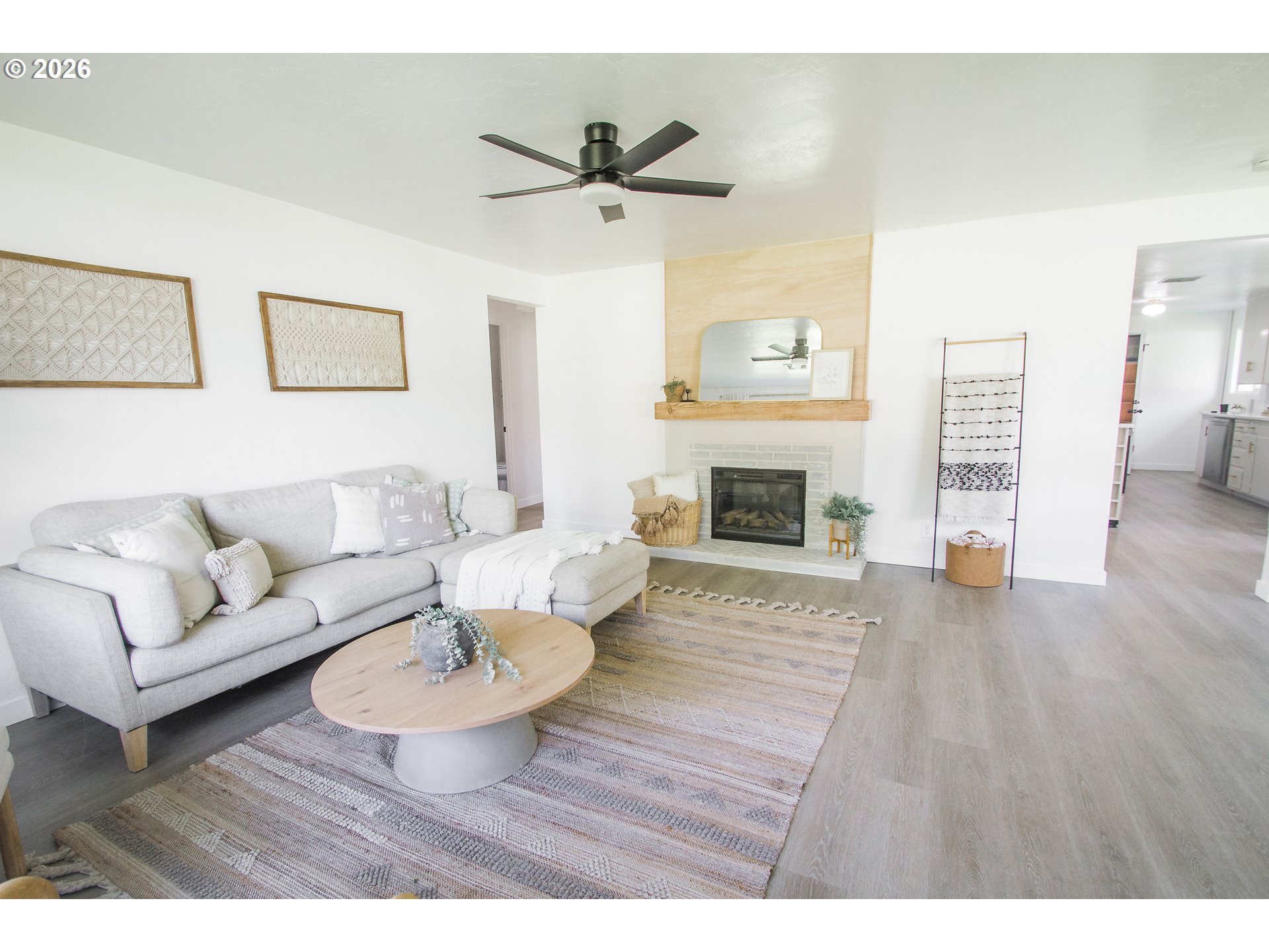 1490 Taft Street Eugene, OR 97402 - Photo 6 of 36 a living room with furniture and a fireplace