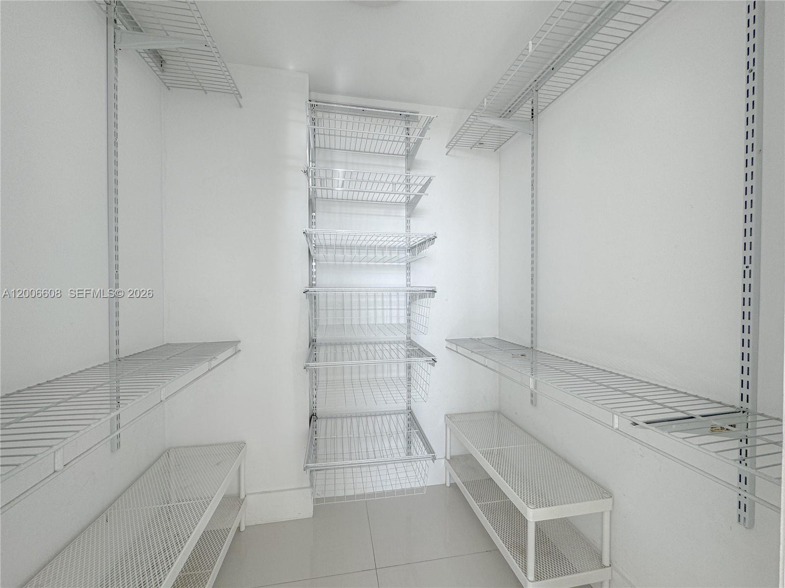 210 Seaview Drive, Unit 403 Key Biscayne, FL 33149 - Photo 11 of 31 a bathroom with a bathtub and shower