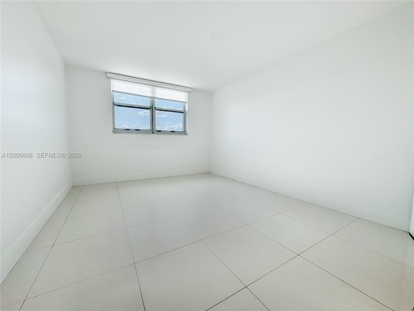 210 Seaview Drive, Unit 403 Key Biscayne, FL 33149 - Photo 14 of 31 an empty room with a empty space and window