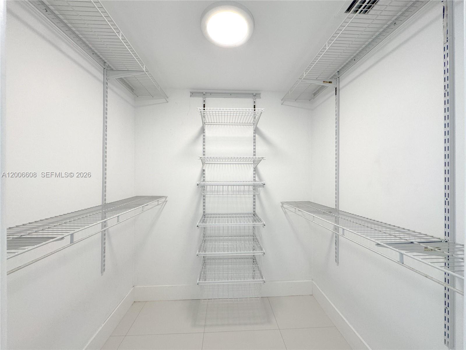 210 Seaview Drive, Unit 403 Key Biscayne, FL 33149 - Photo 16 of 31 a view of walk in closet