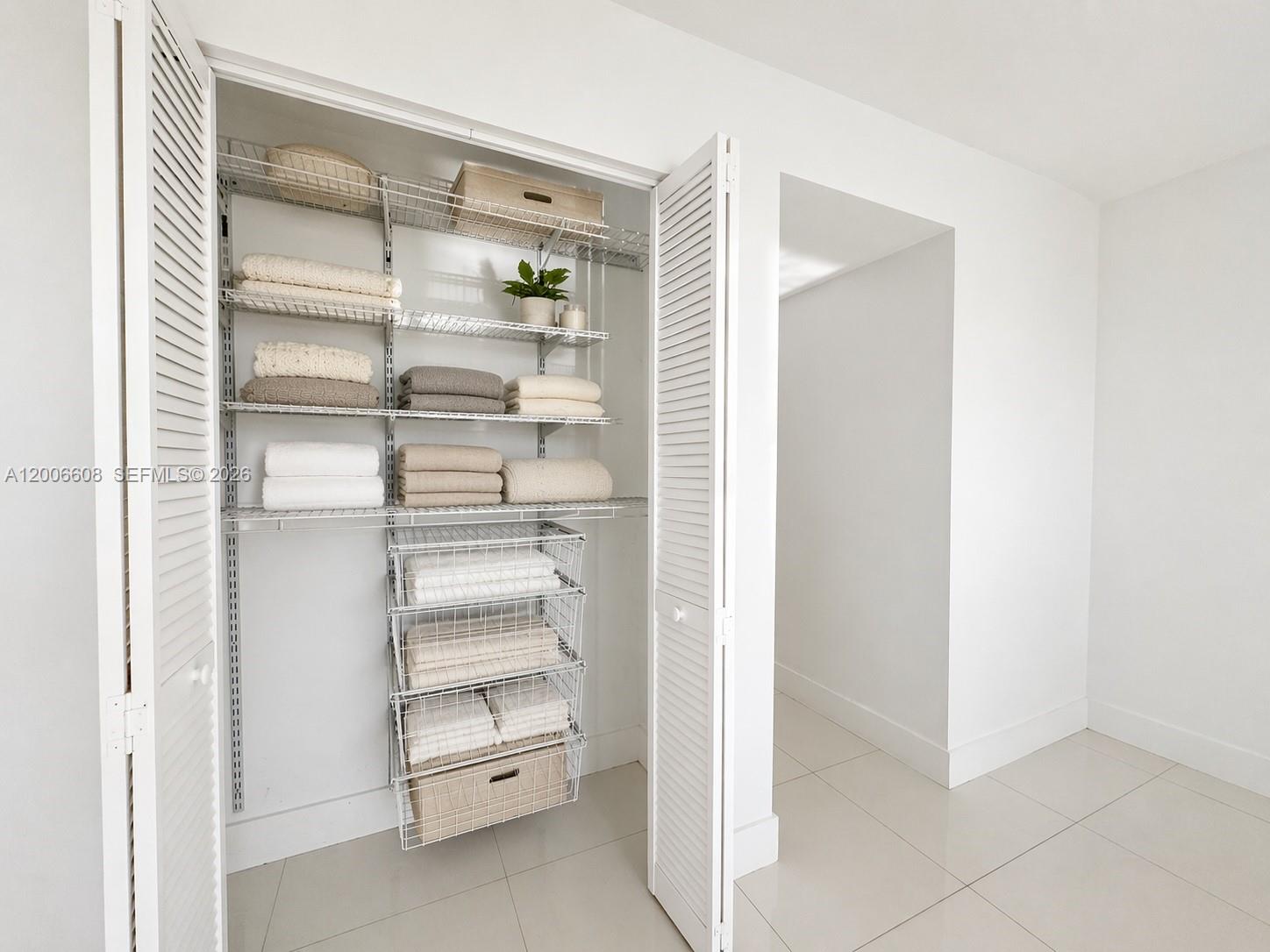 210 Seaview Drive, Unit 403 Key Biscayne, FL 33149 - Photo 17 of 31 a view of an empty walk in closet