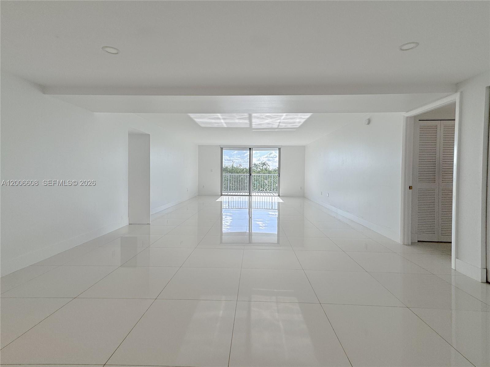 210 Seaview Drive, Unit 403 Key Biscayne, FL 33149 - Photo 24 of 31 a view of an empty room with a window