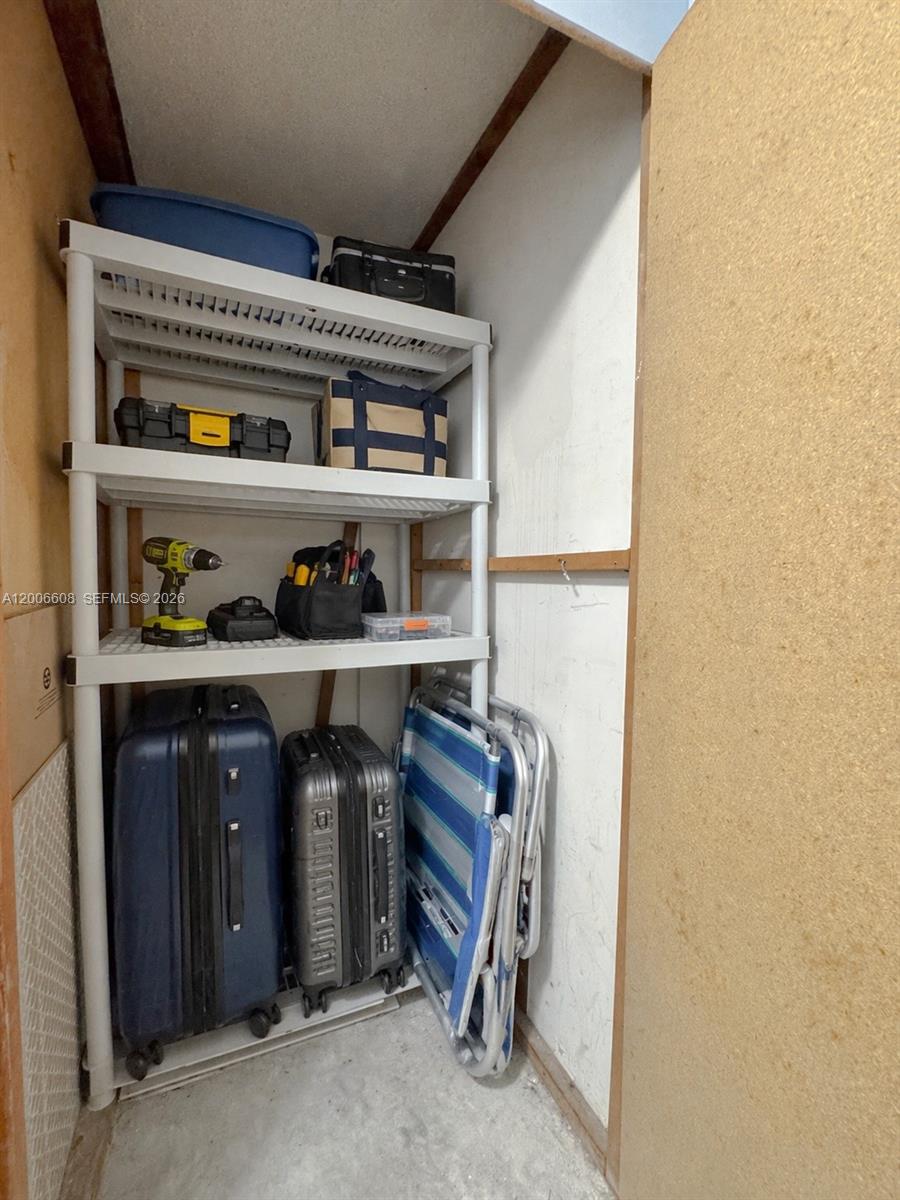 210 Seaview Drive, Unit 403 Key Biscayne, FL 33149 - Photo 27 of 31 a view of storage and utility room