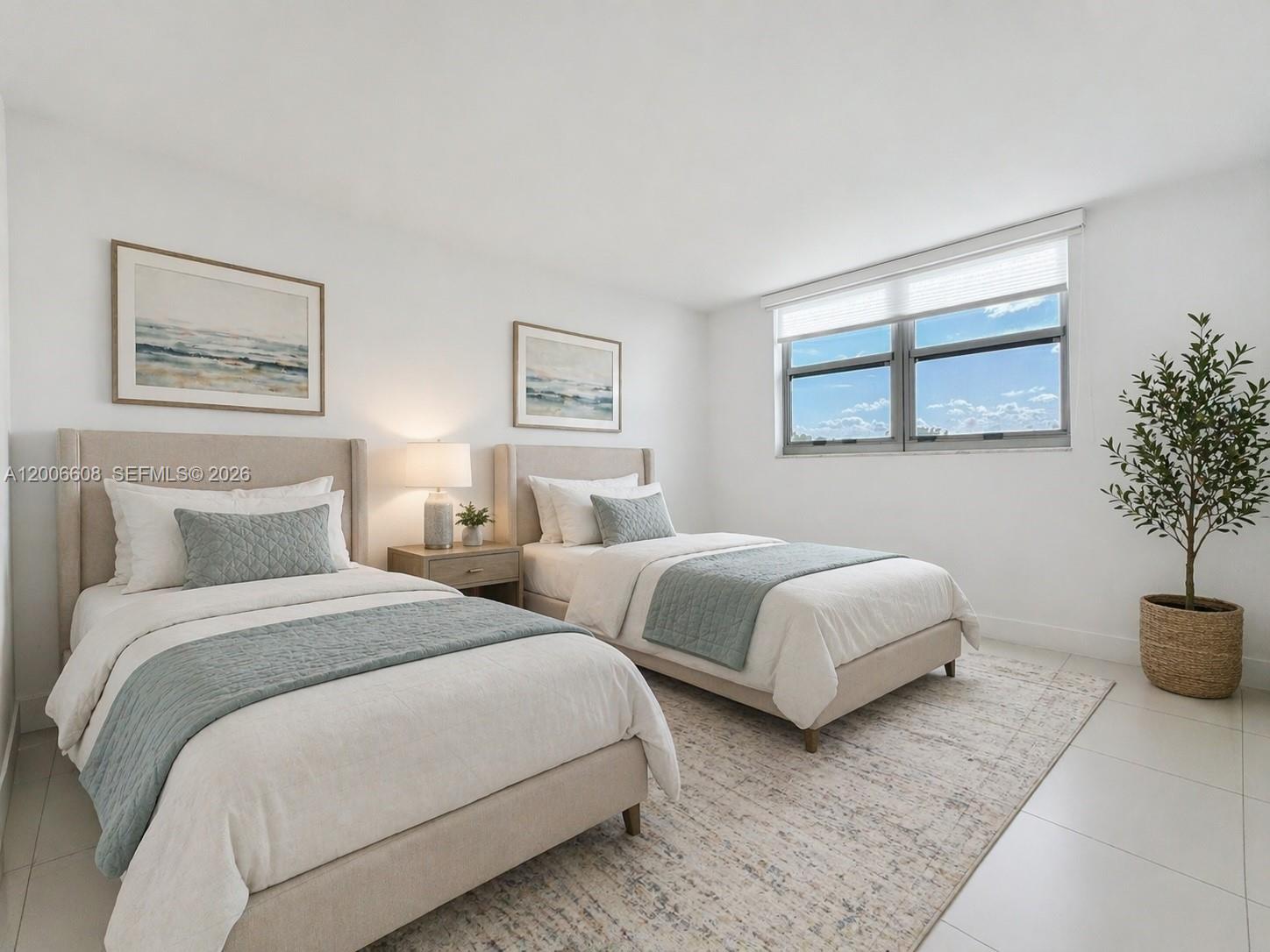 210 Seaview Drive, Unit 403 Key Biscayne, FL 33149 - Photo 7 of 31 a bedroom with two beds and potted plant