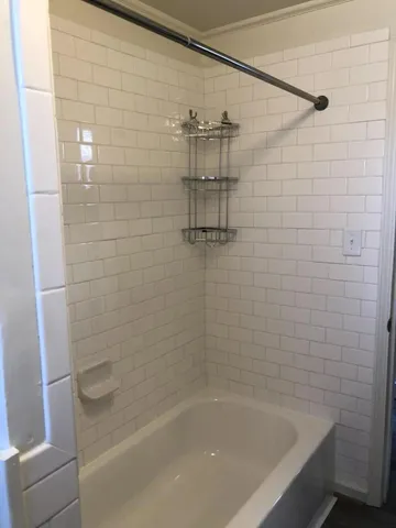 a close up of a bathtub in a bathroom