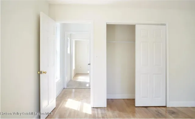 a view of a room with white door