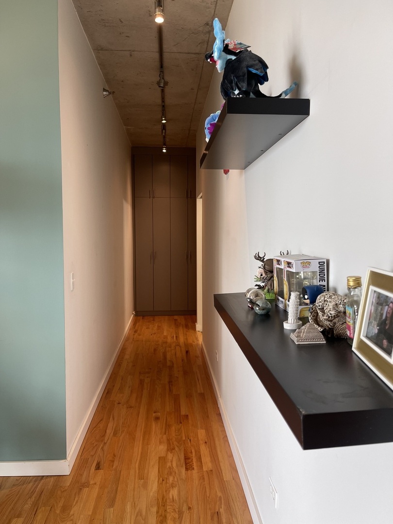 1720 South Michigan Avenue, Unit 2708 Chicago, IL 60616 - Photo 12 of 18 a view of a living room with a chandelier