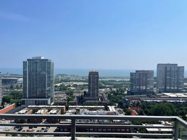 a view of city with tall buildings