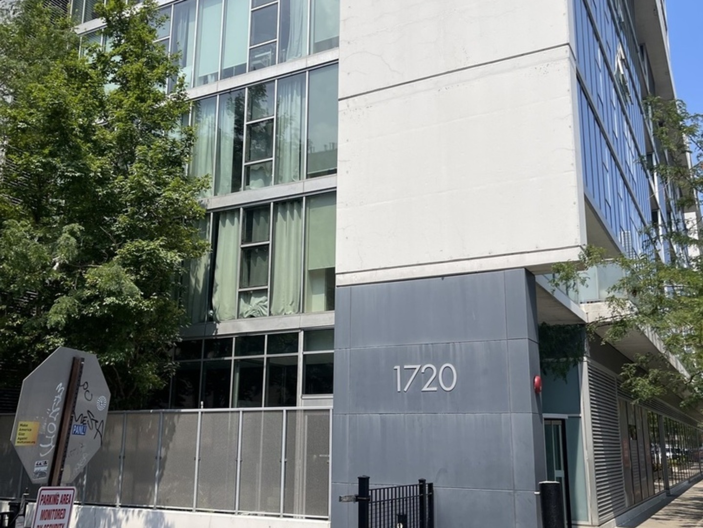 1720 South Michigan Avenue, Unit 2708 Chicago, IL 60616 - Photo 2 of 18 a front view of a house with a yard