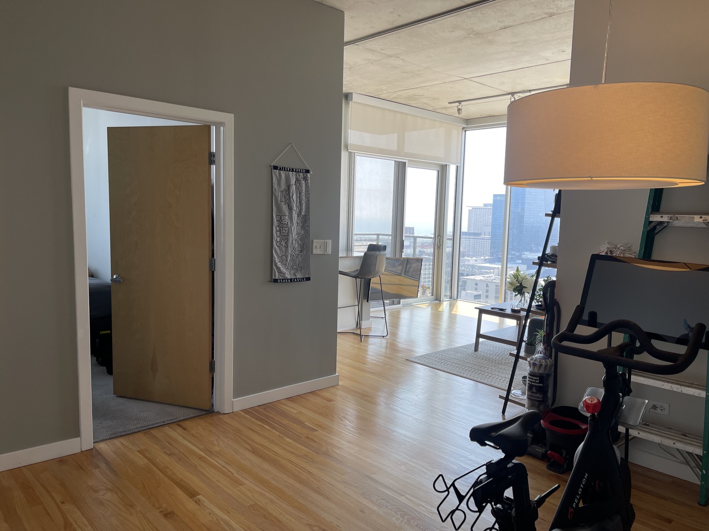 1720 South Michigan Avenue, Unit 2708 Chicago, IL 60616 - Photo 7 of 18 a view of a workspace with furniture and a window