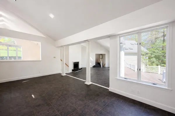 a front view of a house with yard