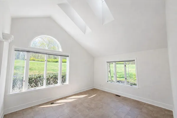 a view of a garden from a balcony