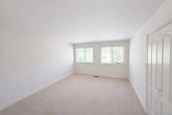 a view of balcony with couple of trees
