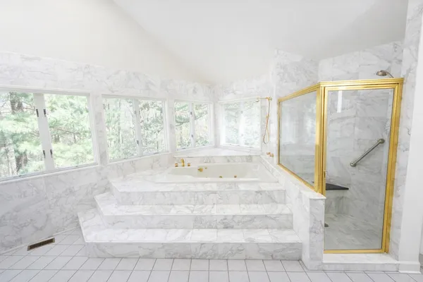 a view of a forest with a yard