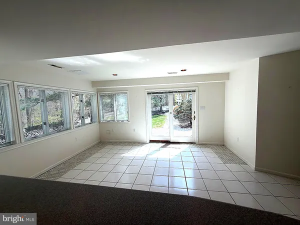 a view of a field with a mountain