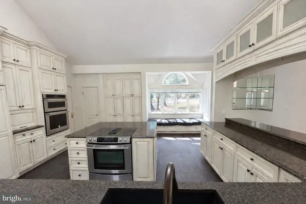 a view of fireplace and window in a room