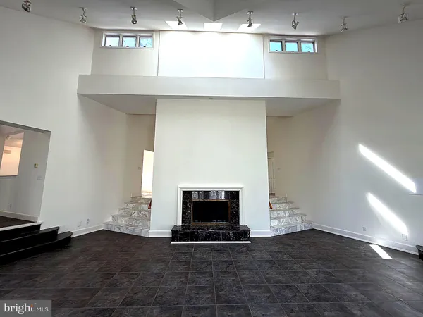 an empty room with windows