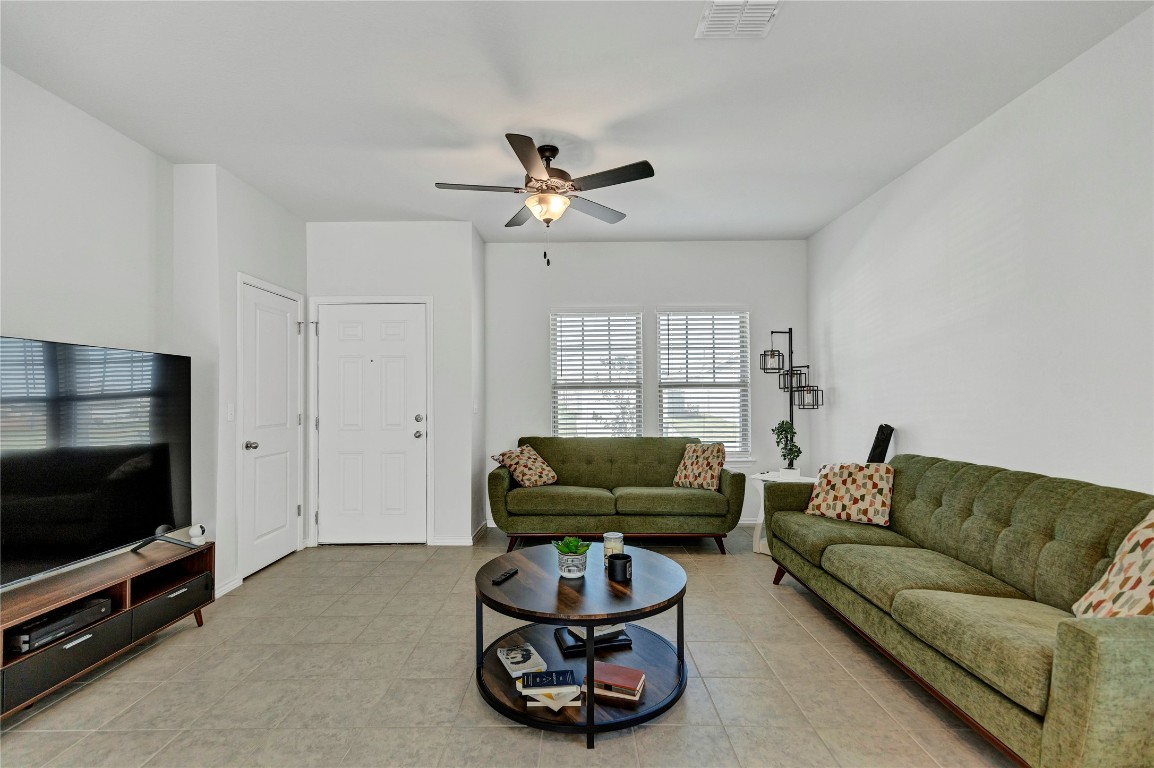 380 Witchhazel Way San Marcos, TX 78666 - Photo 3 of 22 a living room with furniture and a flat screen tv