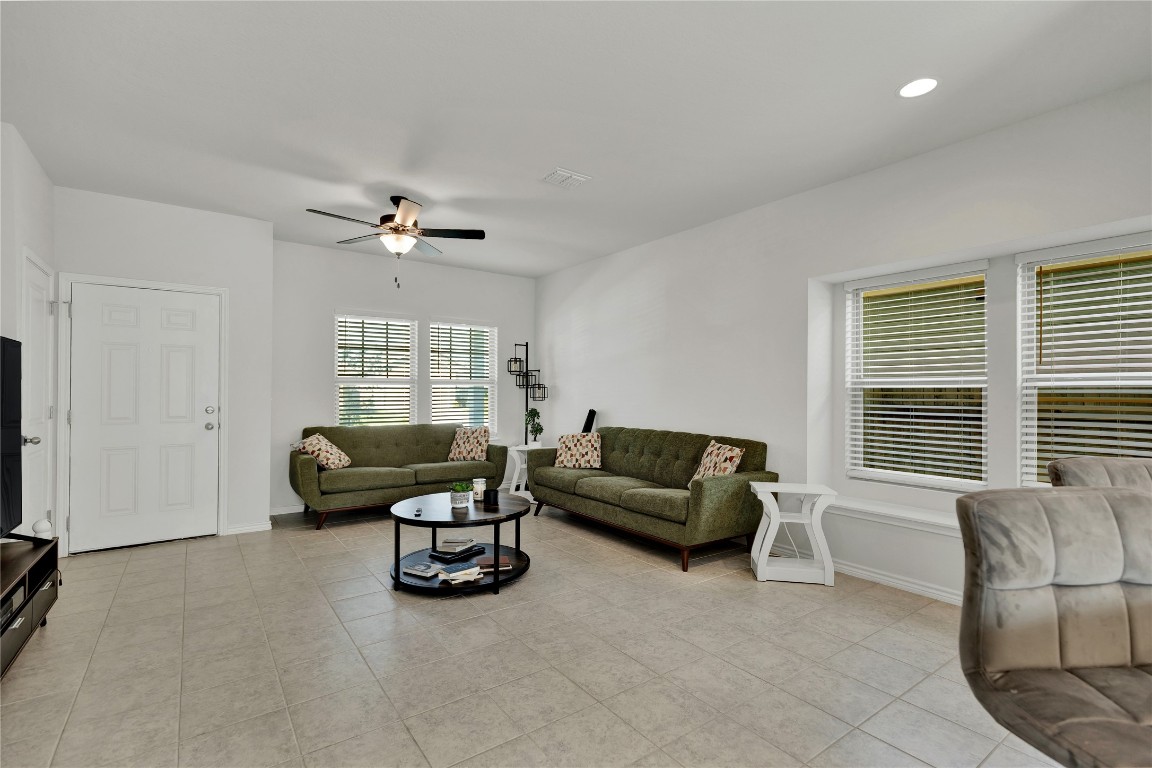 380 Witchhazel Way San Marcos, TX 78666 - Photo 4 of 22 a living room with furniture and windows